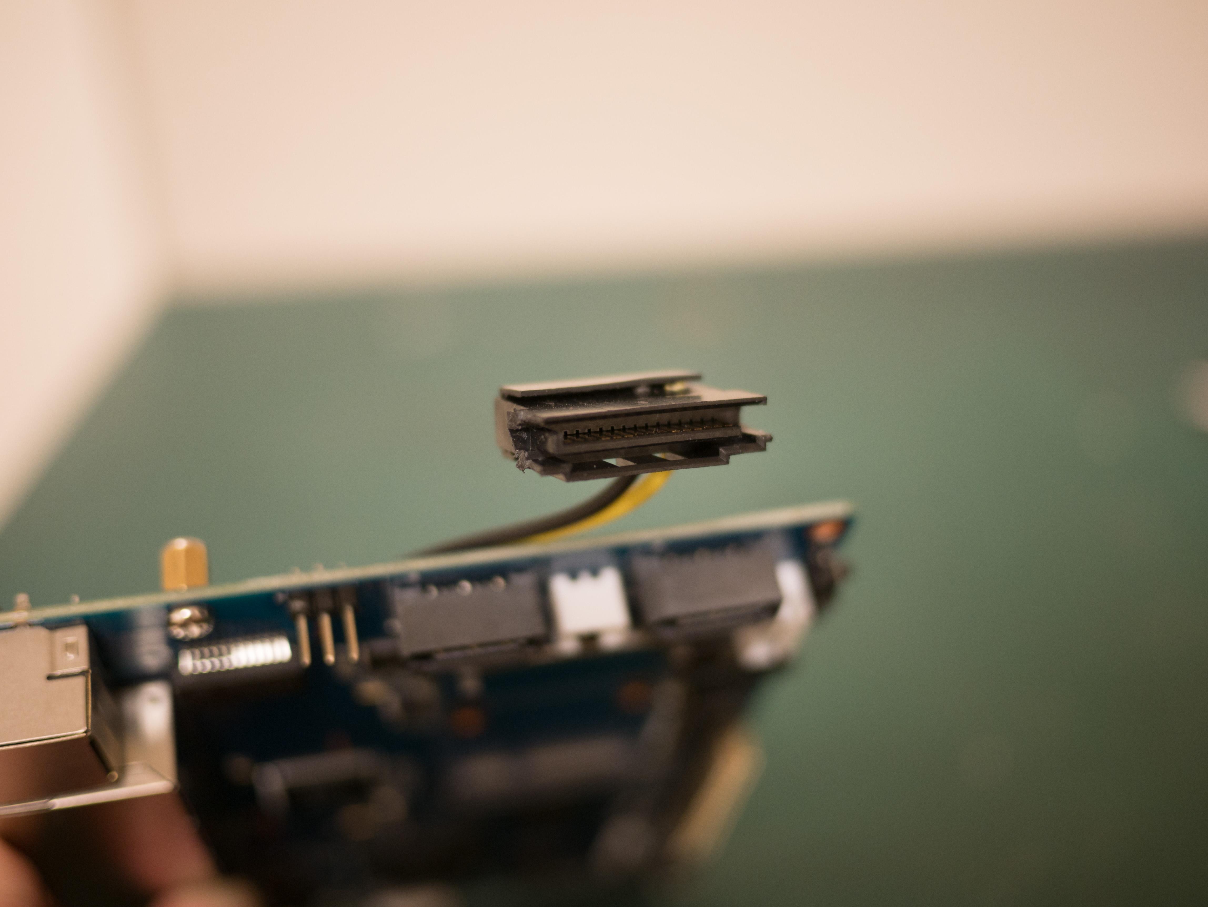 Male SATA power connector with snapped off edges