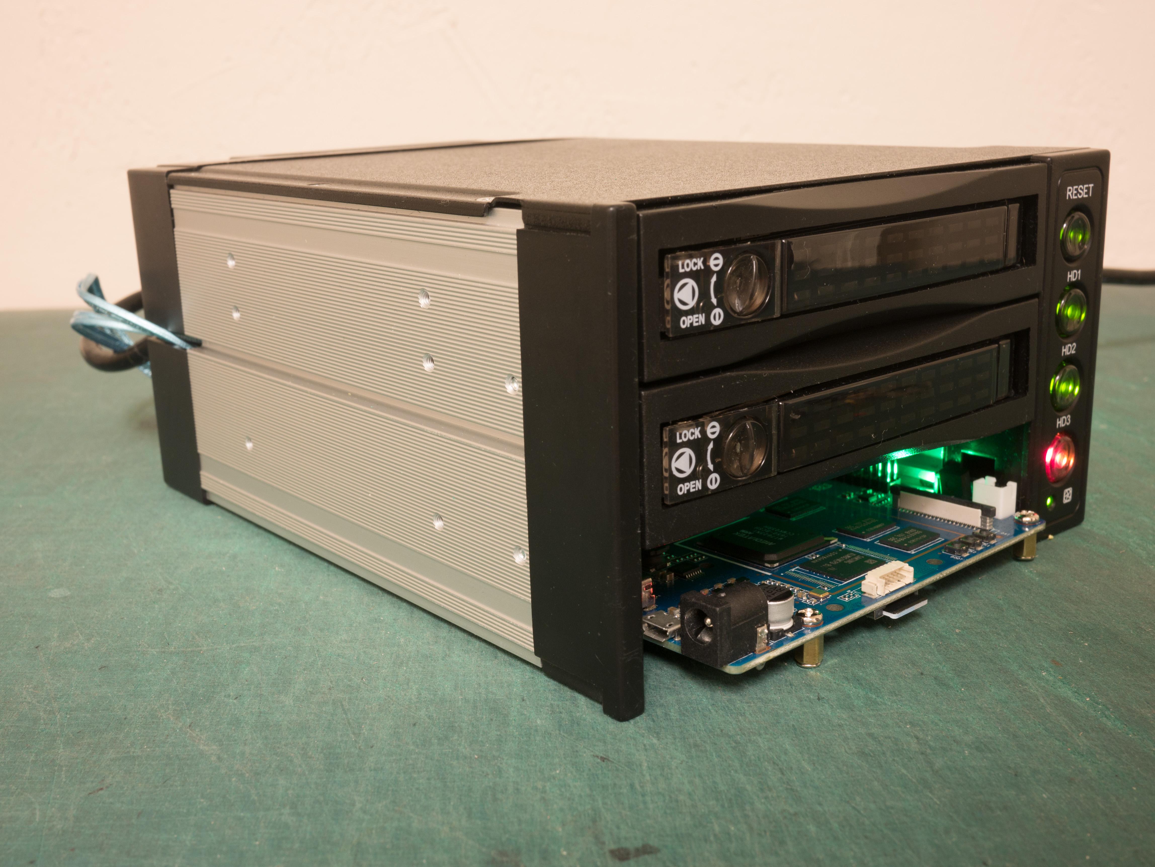 Front view of NAS with bottom removed and board powered on